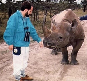 Robert with Murani, a tame rhinoceros
