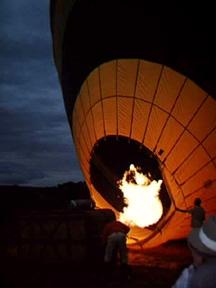 Hot air balloon prepping for flight over Masai Mara