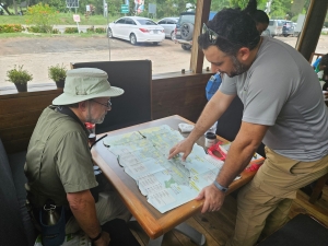Robert and guide Manny reviewing a map
