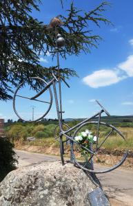 Bike sculpture with rebar, El Acebo de San Miguel