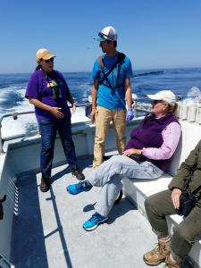 Shearwater (seated) and two guides
